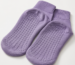 Purple anti-slip socks with raised silicone grip dots on the sole