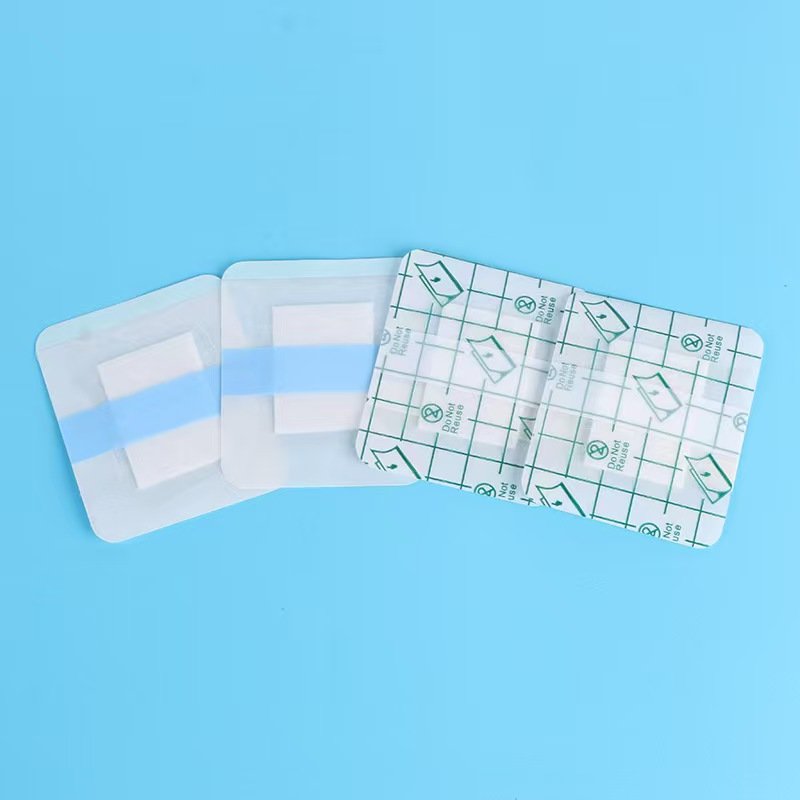 Medical dressings with soft silicone adhesive