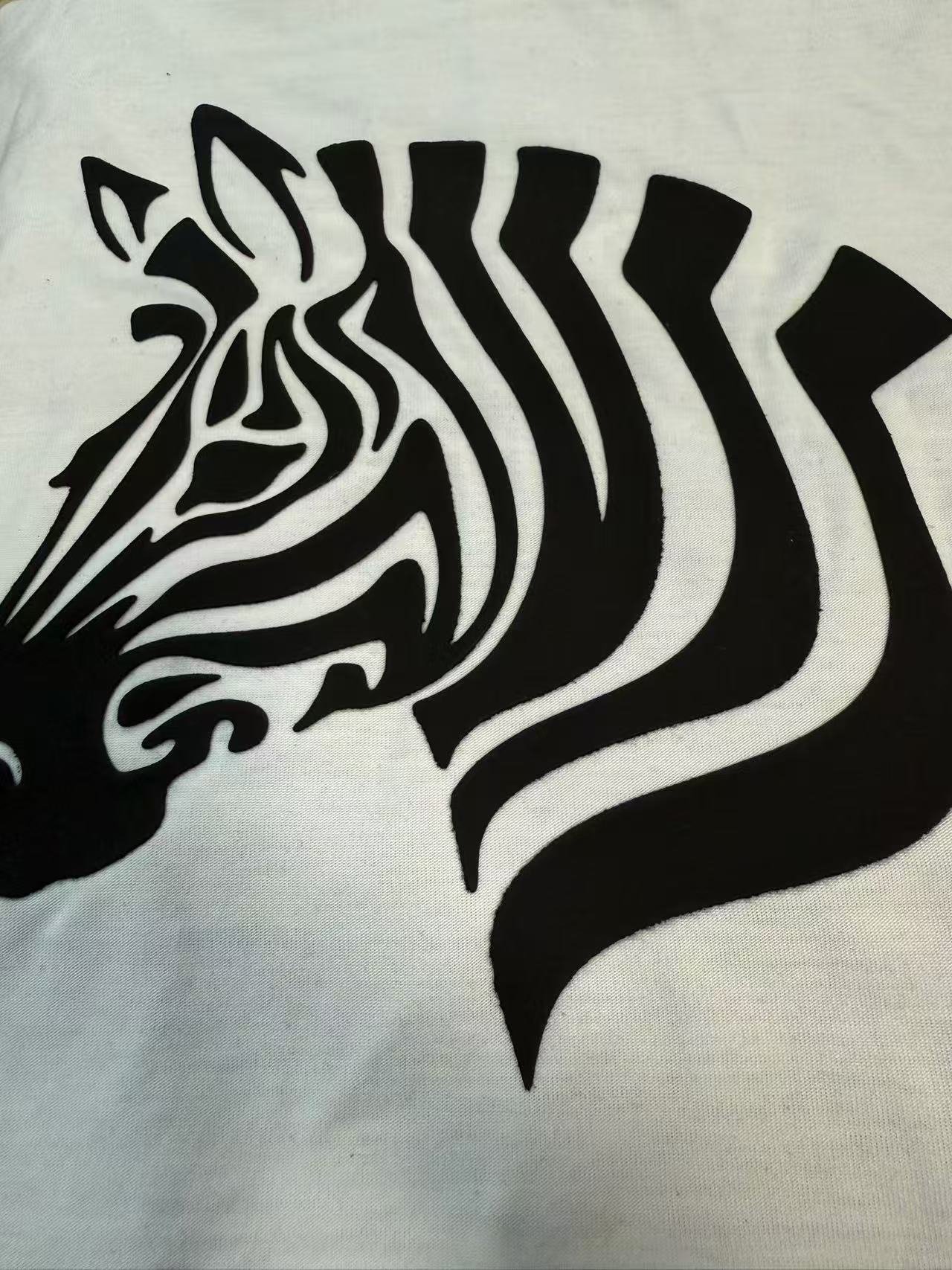 3D silicone screen printing on fabric showing silicone ink adhesion